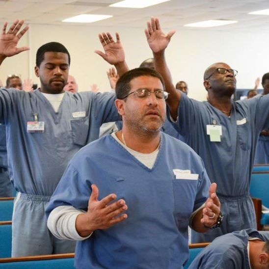 prisoners praying